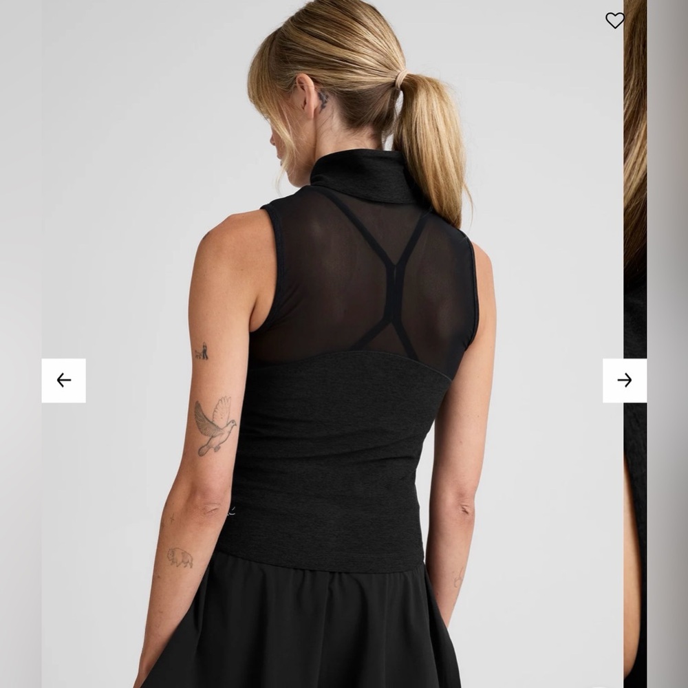 BRAND NEW never worn. Beyond Yoga black zip-up vest. Size small.